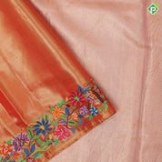 Goldish orange base silver zari diamond tissue weaved multi color thread embroidered border embroidery silk saree