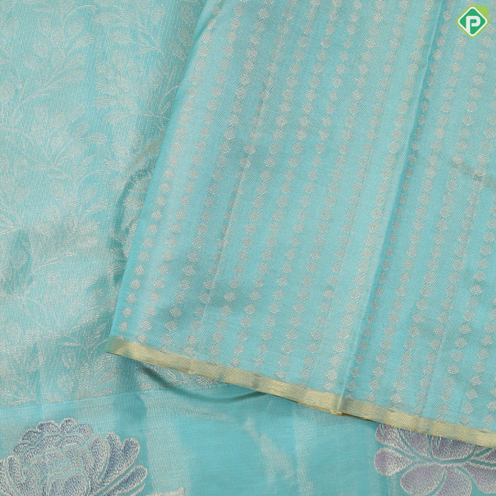 Sea green gold zari grand floral tissue weaved design self meena work floral border trendy tissue silk saree