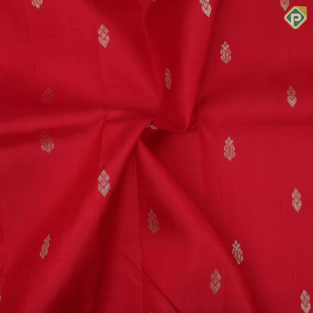 Tomato red gold zari fancy butta contrast mango yellow gold zari one side border silk saree