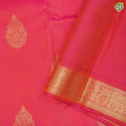Bottle green gold zari fancy thilagam butta design self color gold zari peacock elephant butts edge border traditional silk saree
