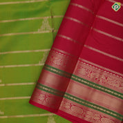 parrot green gold zari velthari lines double peacock butta rani red gold zari meena work border traditional silk saree