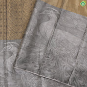 Golden yellow grand waves zari by zari weaved design Greyish self art effect scenery border trendy tissue silk saree