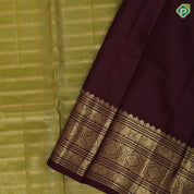Mustard green gold zari rangoli lines design contrast syrup brown gold zari mango rangoli butta border traditional vintage silk saree