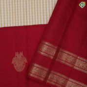 Cream with beige checks body design maroon gold zari butta high three part border concept vintage silk saree