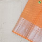 White silver zari small rangoli lines peach orange silver zari multi design border exclusive bridal silk saree
