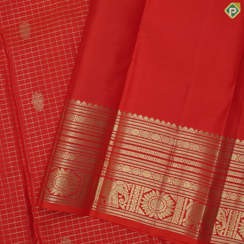 Fanta orange gold zari checked rudraksham kandapiranda butta self multi lines border vintage traditional silk saree