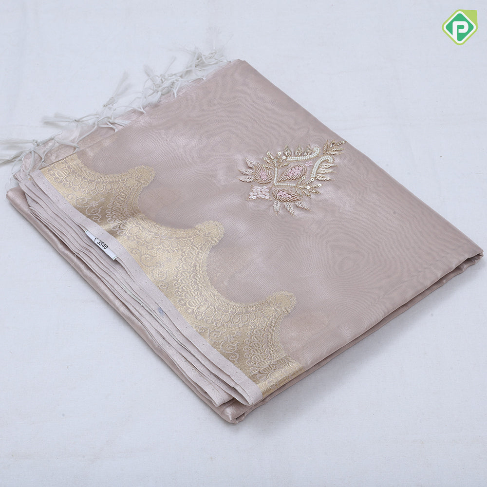 Pastel shade tissue Aari work flower design self gold zari cut border trending fancy tissue saree