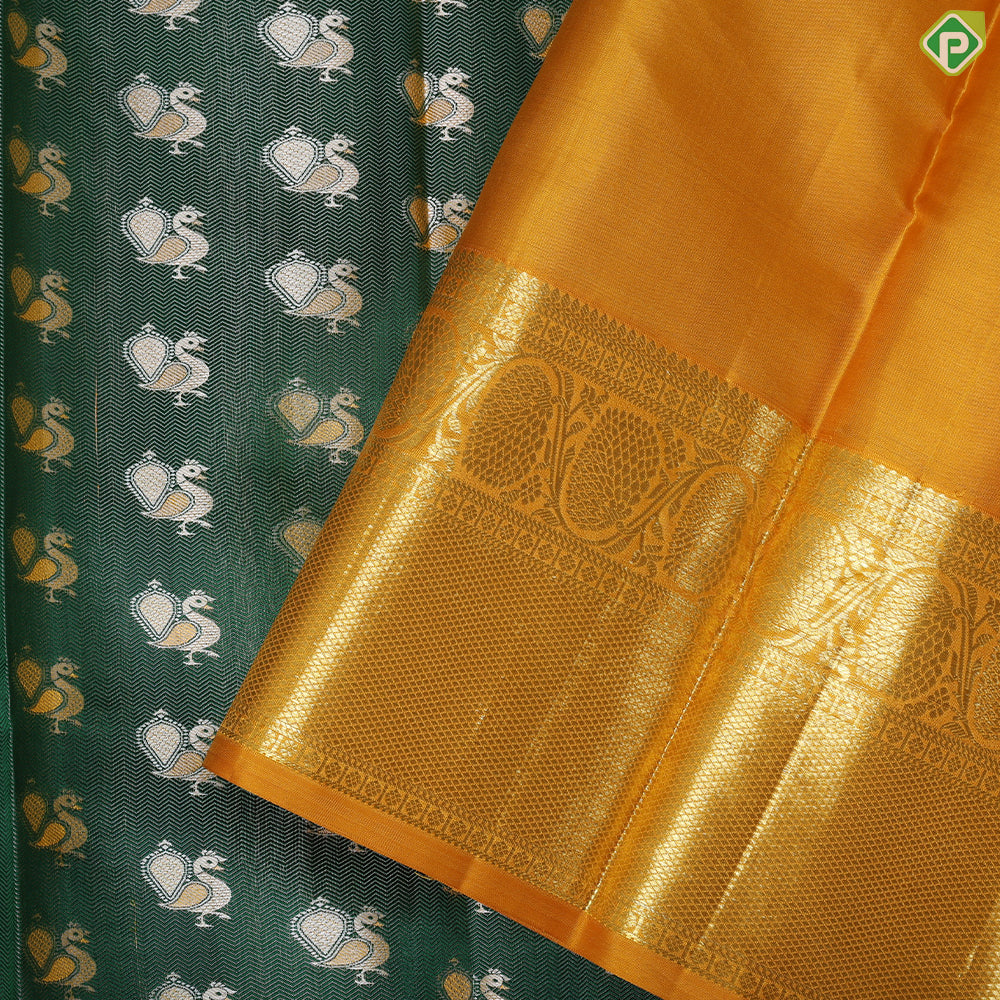 Pine Green peacock embossed butta design contrast mustard gold zari peacock butta border trendy silk saree