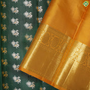 Pine Green peacock embossed butta design contrast mustard gold zari peacock butta border trendy silk saree