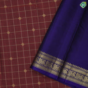 Rust color gold zari checks with rudraksham butta berry blue gold zari peacock edge border traditional silk saree