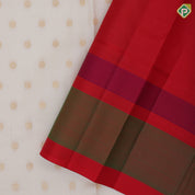 cream white gold zari flower butta design red meena work border traditional gift silk saree