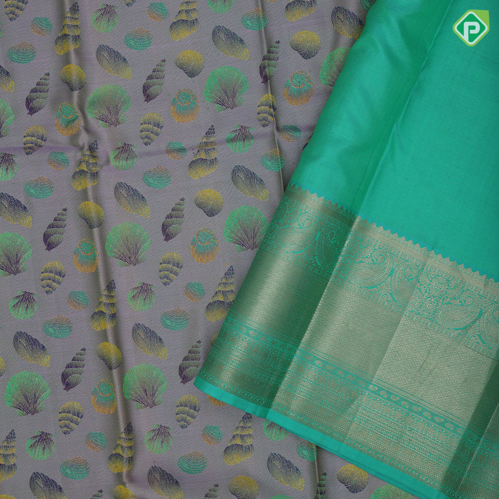 Lavender base multi color sea shells design rexona green gold zari mango butta border trendy designer silk saree