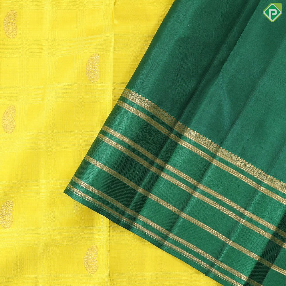 Lemon yellow with mango butta design dark green gold zari multi lines border Traditional silk saree