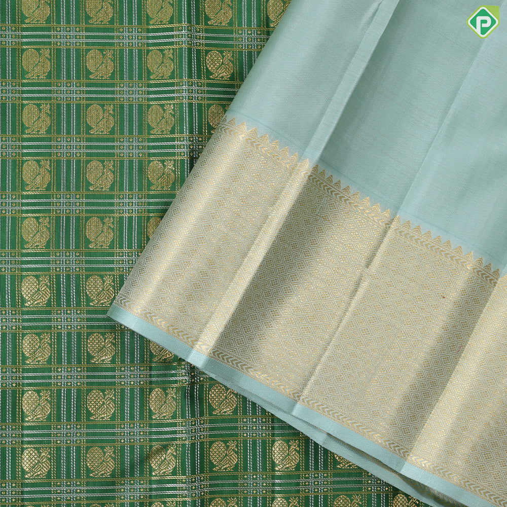 Dark green with peacock butta silver and gold zari checkered sea foam green border traditional silk saree