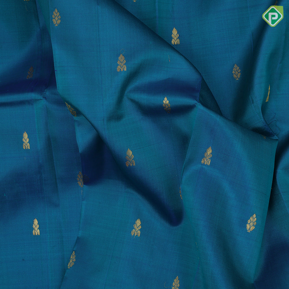 peacock blue gold zari fancy butta contrast green gold zari one side border silk saree