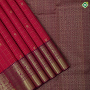 Pinkish red gold zari kattam butta motifs design purple pink gold zari peacock chakkaram butta border traditional silk saree