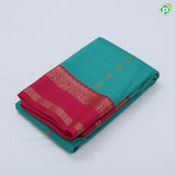Rexona green gold zari stripes and thilagam butta design rani pink gold zari rettapet border Art silk saree