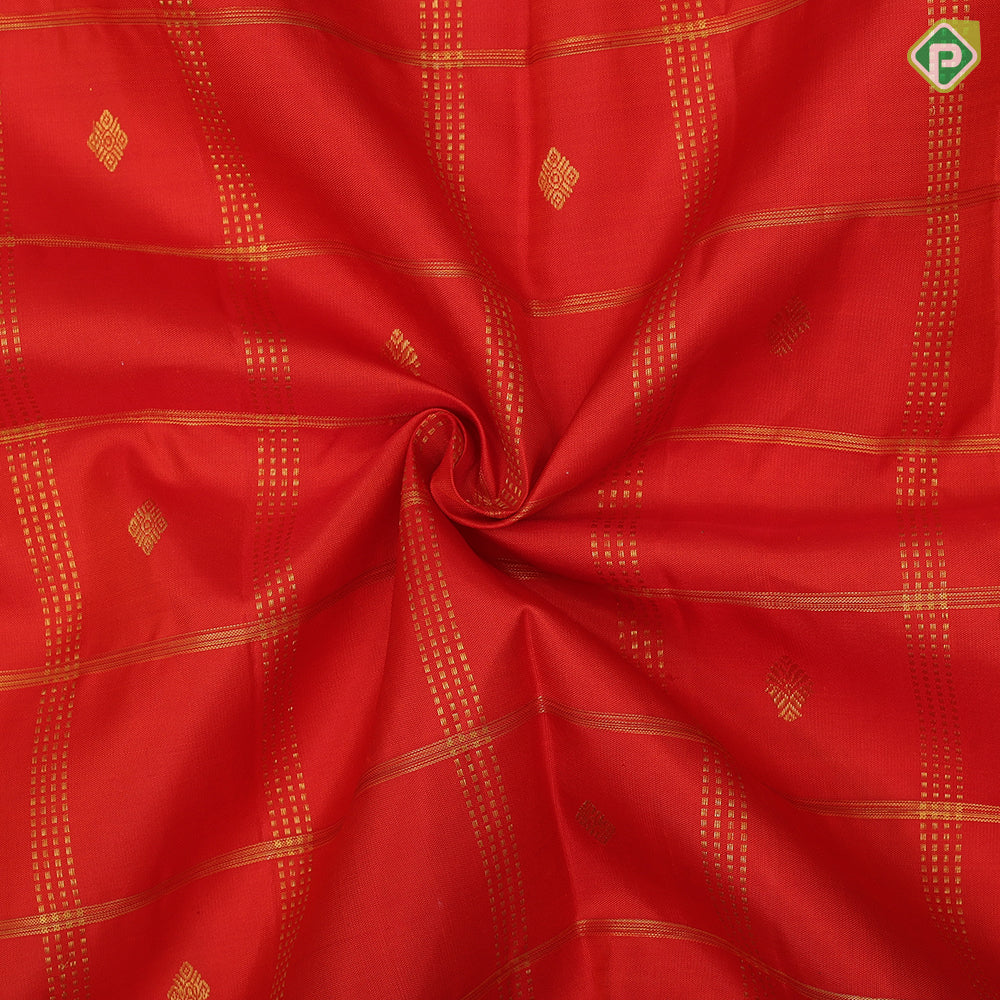 Rust orange gold zari checks and fancy butta brown gold zari particles design pattu paavadai lehanka