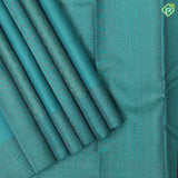 teal color neem zari organized multi design self neem zari rangoli lines border trendy designer silk saree