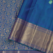 Peacock green gold zari elephant grand floral design self gold zari zig zag border grand bridal silk saree