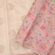 cream with gold zari round butta design baby pink multi colour floral border semi tusser saree