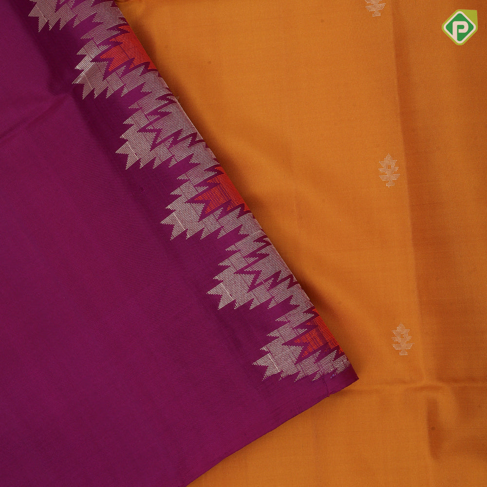 Mustard yellow gold zari fancy butta design grand pallu rani pink gold zari temple border soft silk saree