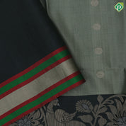 Tea green gold zari chakkaram butta motifs olive green rangoli multi color lines mid gold zari border soft silk saree