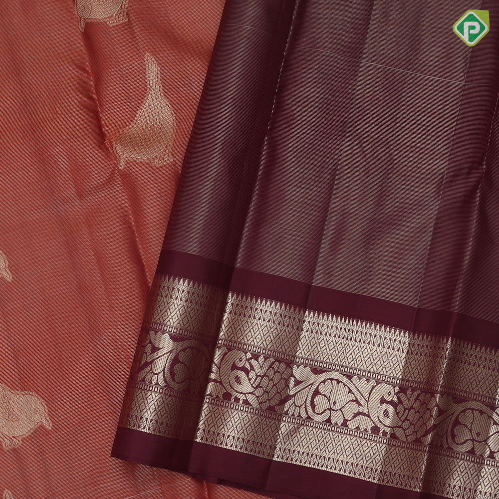 Rust orange tissue weave sparrow butta design contrast maroon gold zari rangoli mid border traditional silk saree