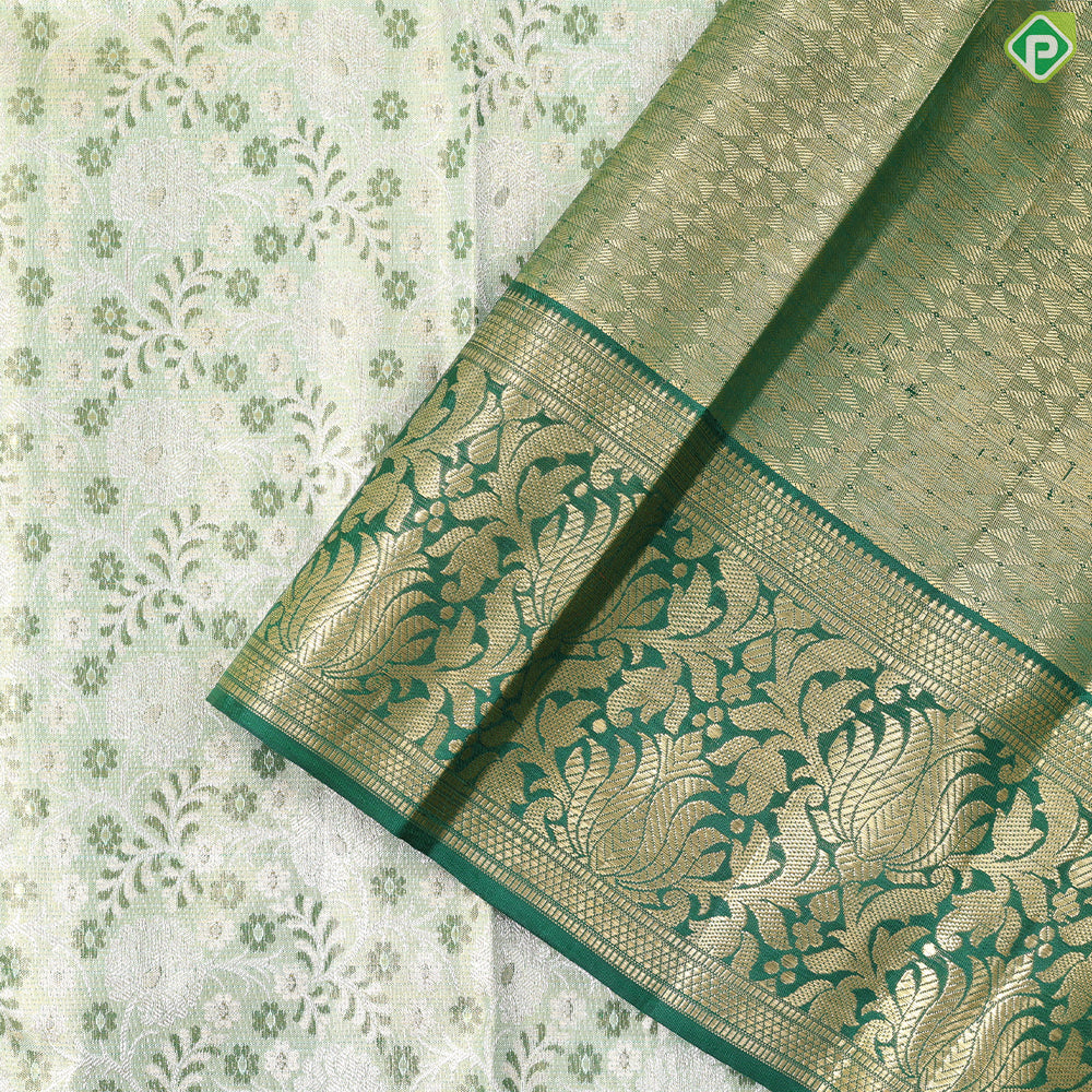 green base with silver and gold zari grand hand woven gold zari lotus design border exclusive bridal silk saree