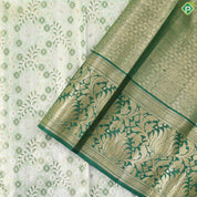 green base with silver and gold zari grand hand woven gold zari lotus design border exclusive bridal silk saree