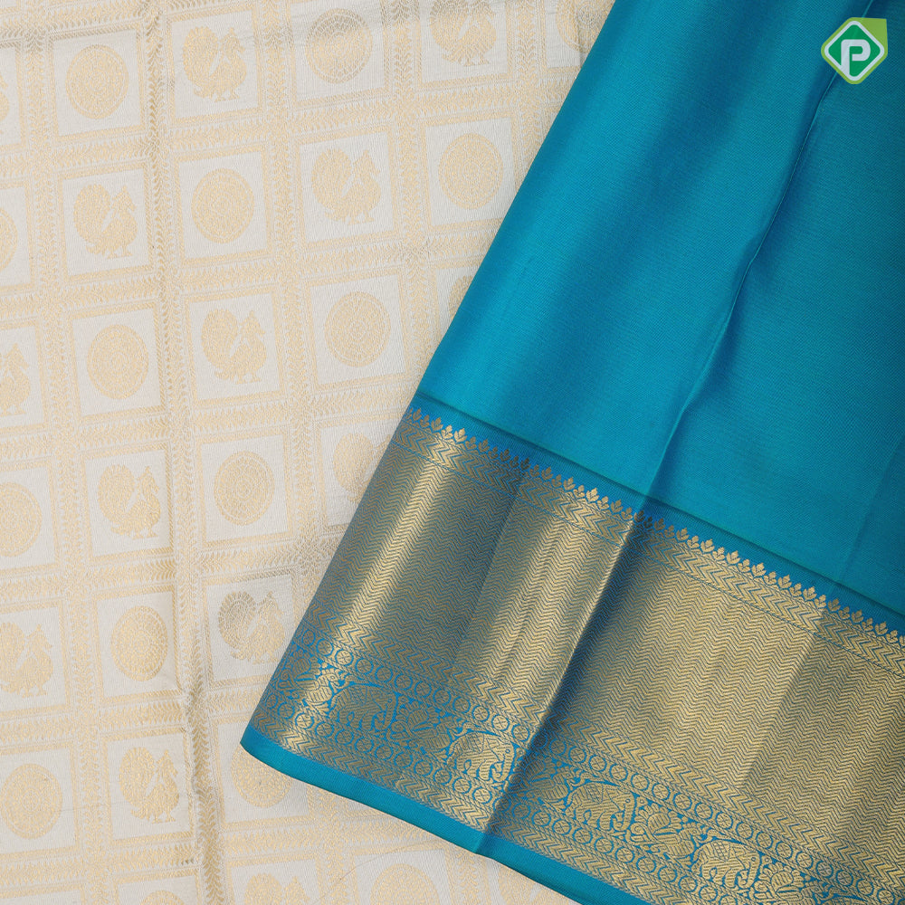 White gold zari annam chakkaram butta checks design peacock green gold zari zig zag stripes border bridal silk saree