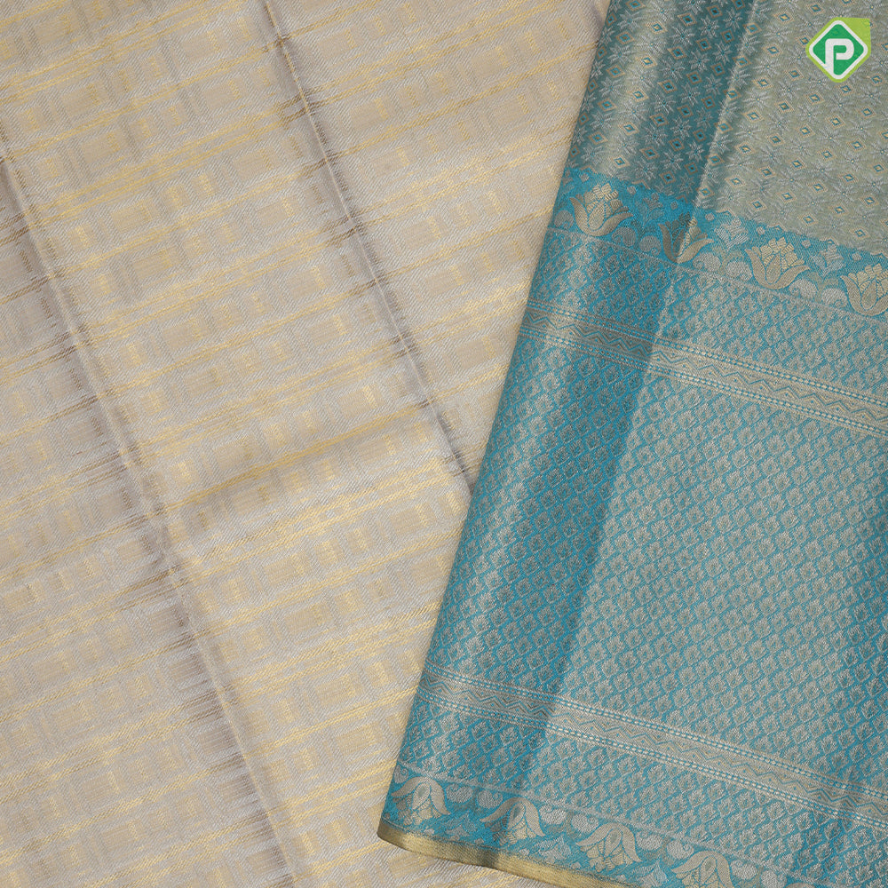 silver gold zari by zari checked weaved design jade green parrot rose cashew detailed border bridal silk saree
