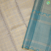 silver gold zari by zari checked weaved design jade green parrot rose cashew detailed border bridal silk saree
