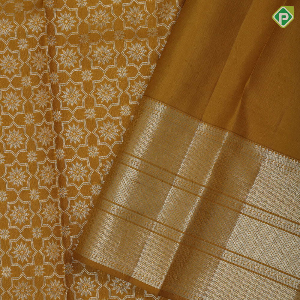 Golden yellow silver zari geometrical floral design self silver zari zig zag border grand silk saree