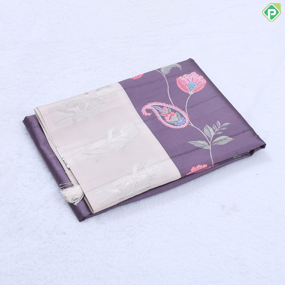 Violet with multi color floral creeper design contrast cream with silver zari flower border semi tusser saree