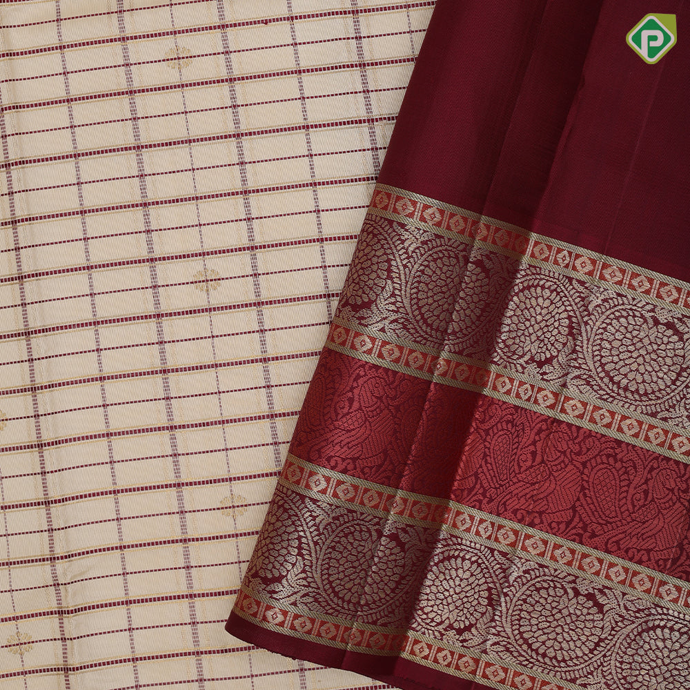 creamy sandal base maroon thread gold zari checks and butta maroon meena work border vintage traditional silk saree