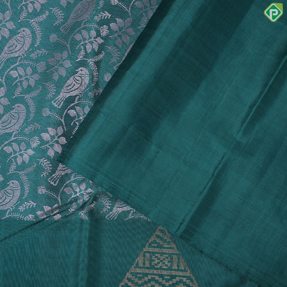 Pine green cream sparrow embossed design self gold zari drop butta border trendy silk saree