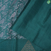 Pine green cream sparrow embossed design self gold zari drop butta border trendy silk saree