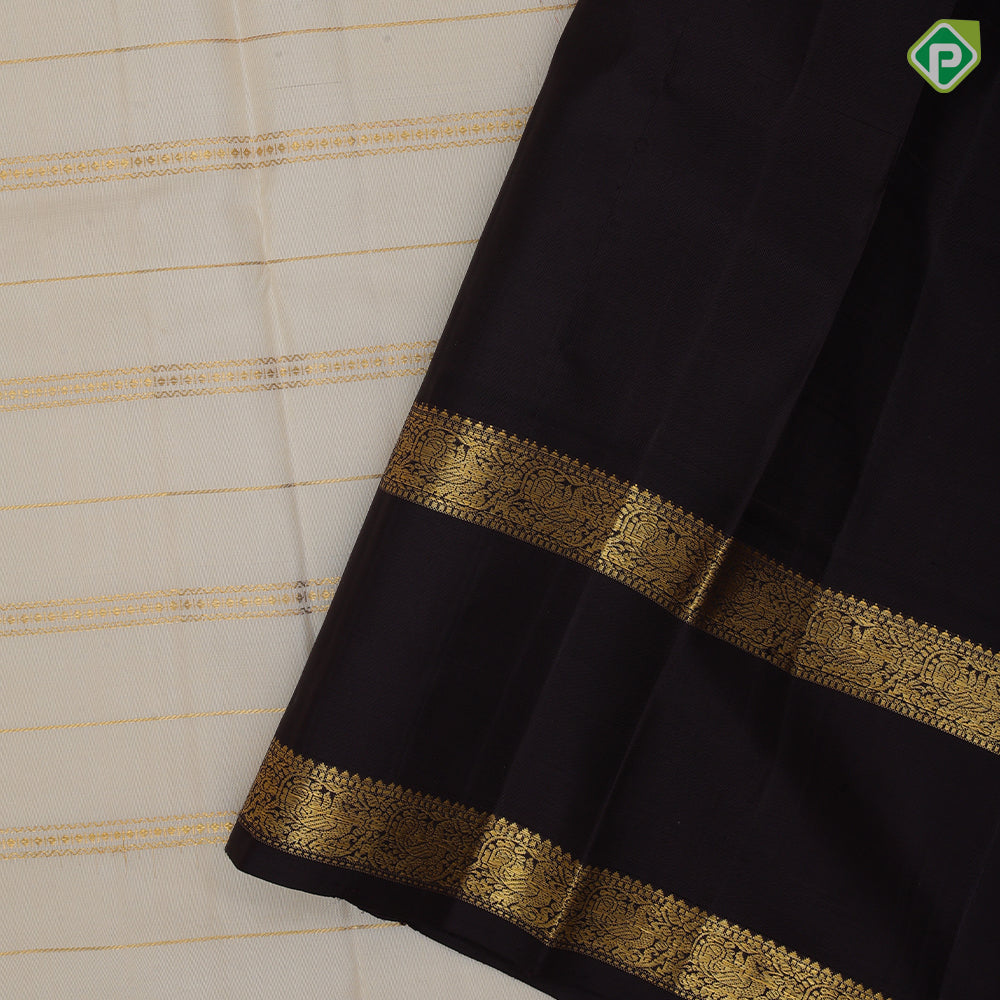 Milk white gold zari velthari design coffee brown peacock floral border design traditional silk saree