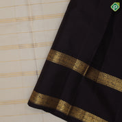 Milk white gold zari velthari design coffee brown peacock floral border design traditional silk saree