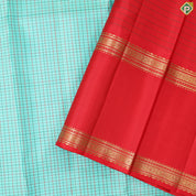 Tea Green with Multi color checkered contrast red rettapet border traditional silk saree