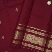 Beetroot red gold zari fancy round butta self gold zari peacock round butta border traditional silk saree