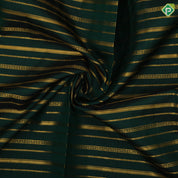 Bottle green gold zari track lines design orangish pink gold zari diamond design pattu paavadai lehanka