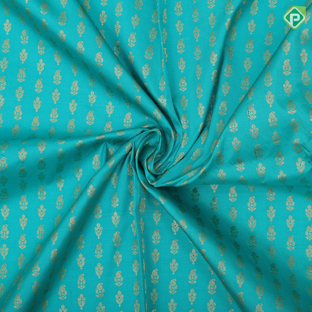 Peacock green gold zari fancy flower butta red gold zari fancy border pattu paavadai lehanka