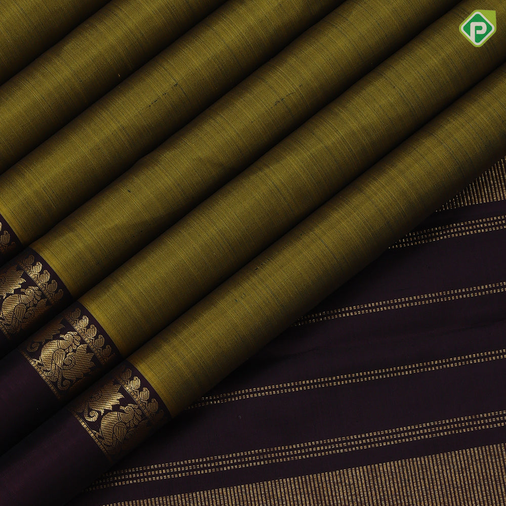Manthulir green plain weaved contrast brown gold zari peacock butta line border Plain traditional vintage silk saree