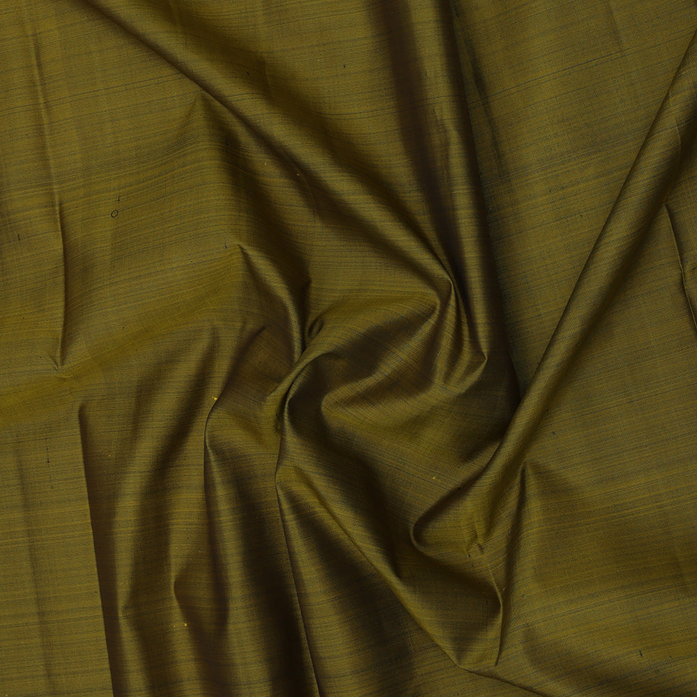 Manthulir green plain weaved contrast brown gold zari peacock butta line border Plain traditional vintage silk saree
