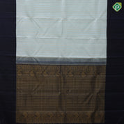 Pastel green silver zari thousand butta design contrast blue plain border bridal silk saree