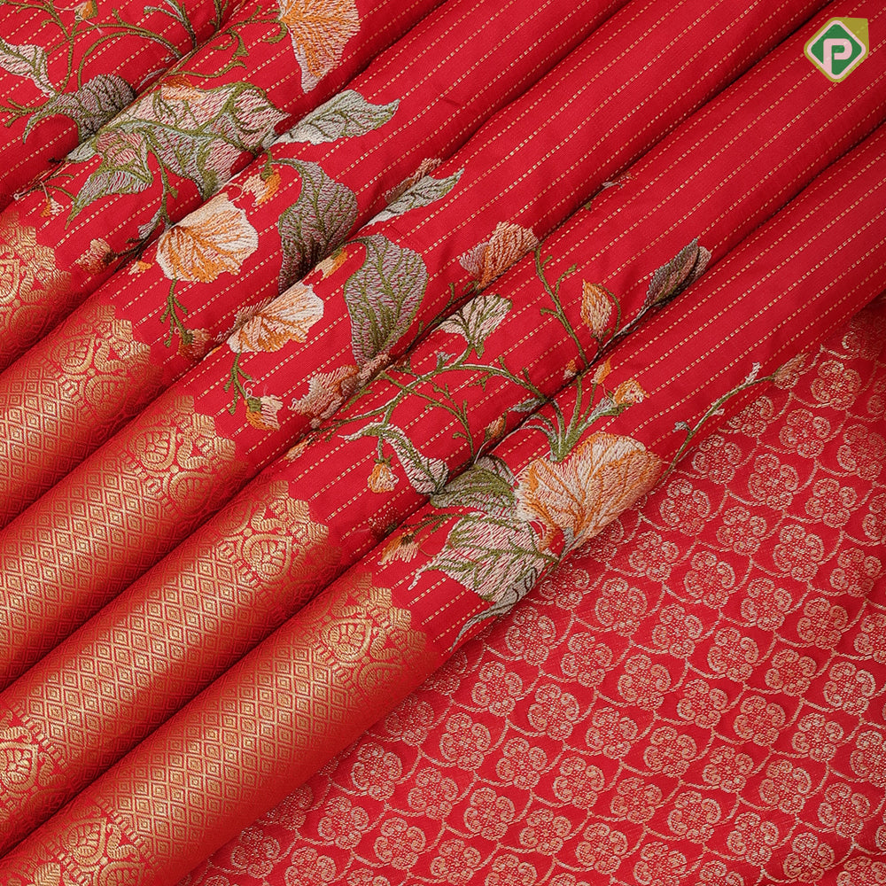 Chilly red silver gold zari stipes and four side floral embroidered self silver gold zari zig zag line border embroidery silk saree