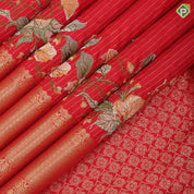Chilly red silver gold zari stipes and four side floral embroidered self silver gold zari zig zag line border embroidery silk saree