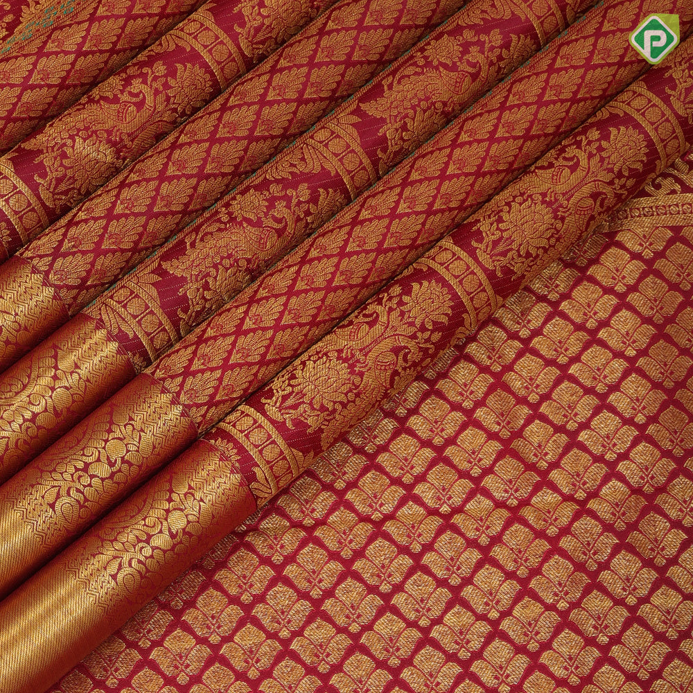 Maroon gold zari thread work double peacock design self gold zari floral bavanji border grand silk saree